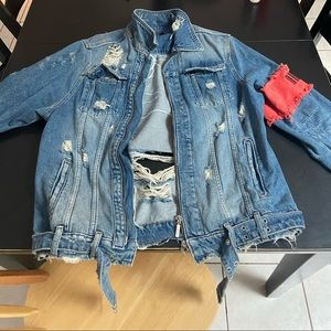 Jaffary Sudios blue denim trucker jacket.